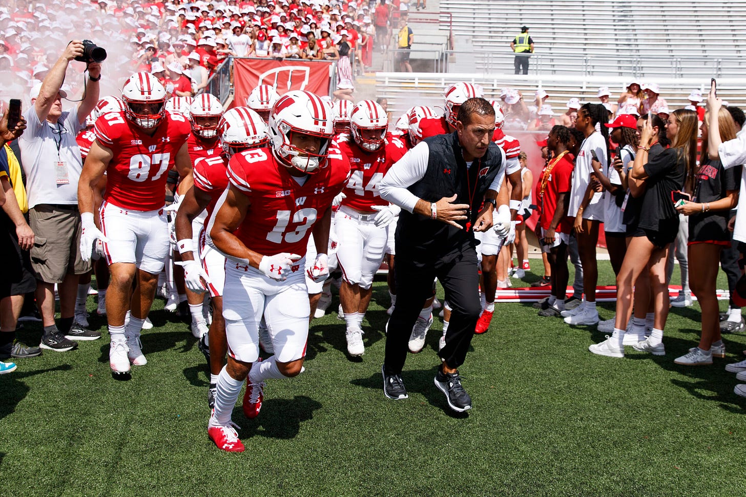 Wisconsin football; Badgers head coach Luke Fickell leads his program onto the field