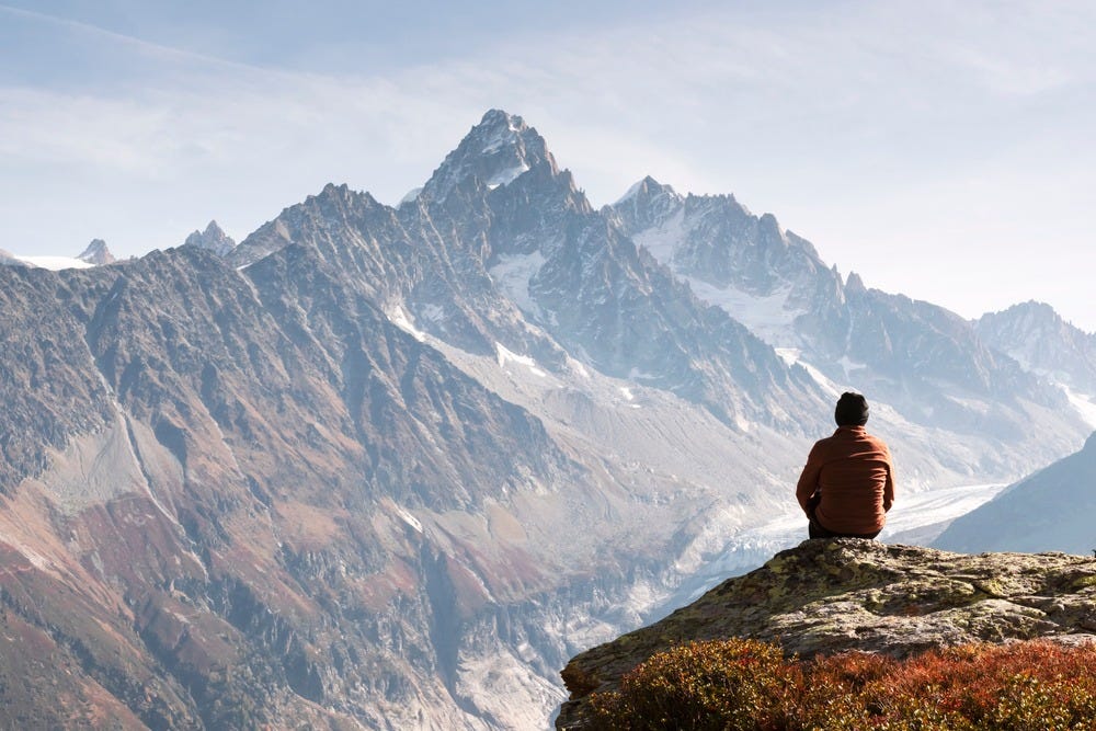 May be an image of 1 person, the Tre Cime di Lavaredo and mountain