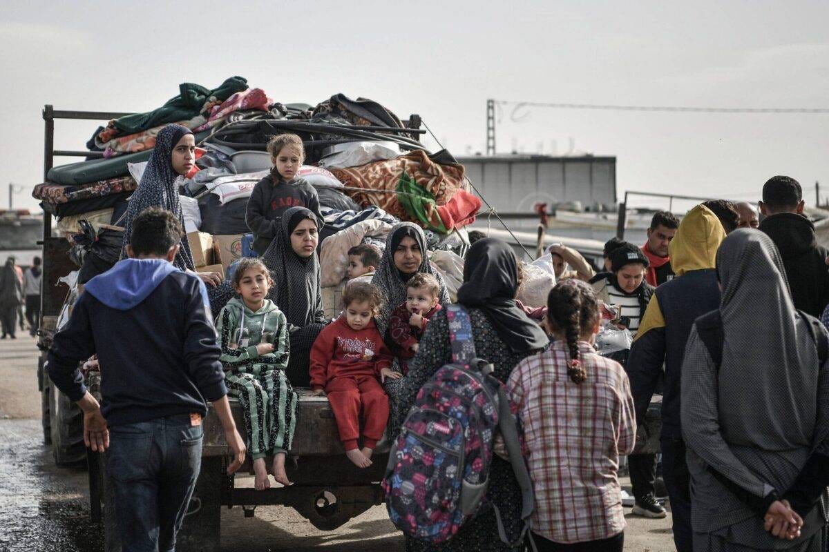 Palestinian Hudair family members on their way to Rafah hoping to find safer place after migrating from Nuseirat due to intense Israeli attacks on Gaza Strip on December 23, 2023 [Abed Zagout/Anadolu Agency]