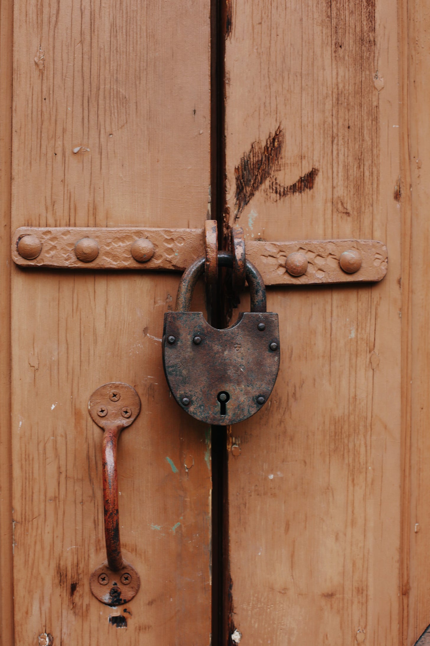 wooden door with a padlock