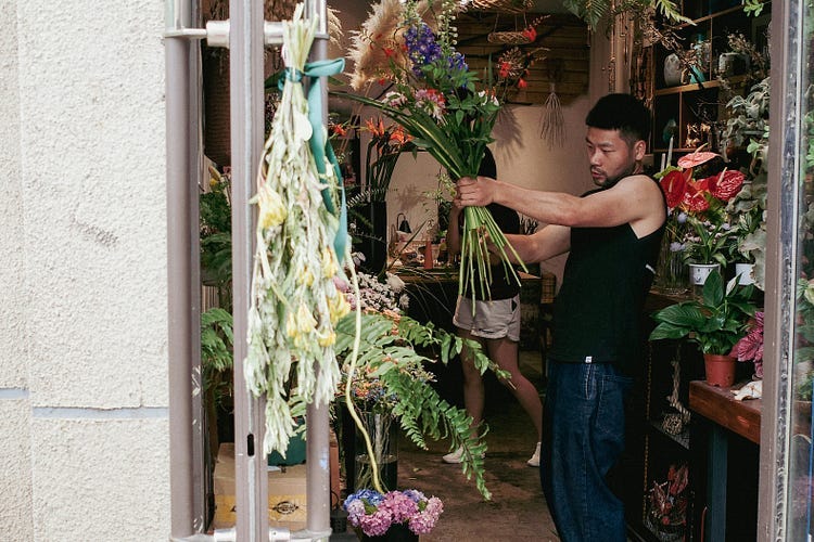 Florist working in his shop.