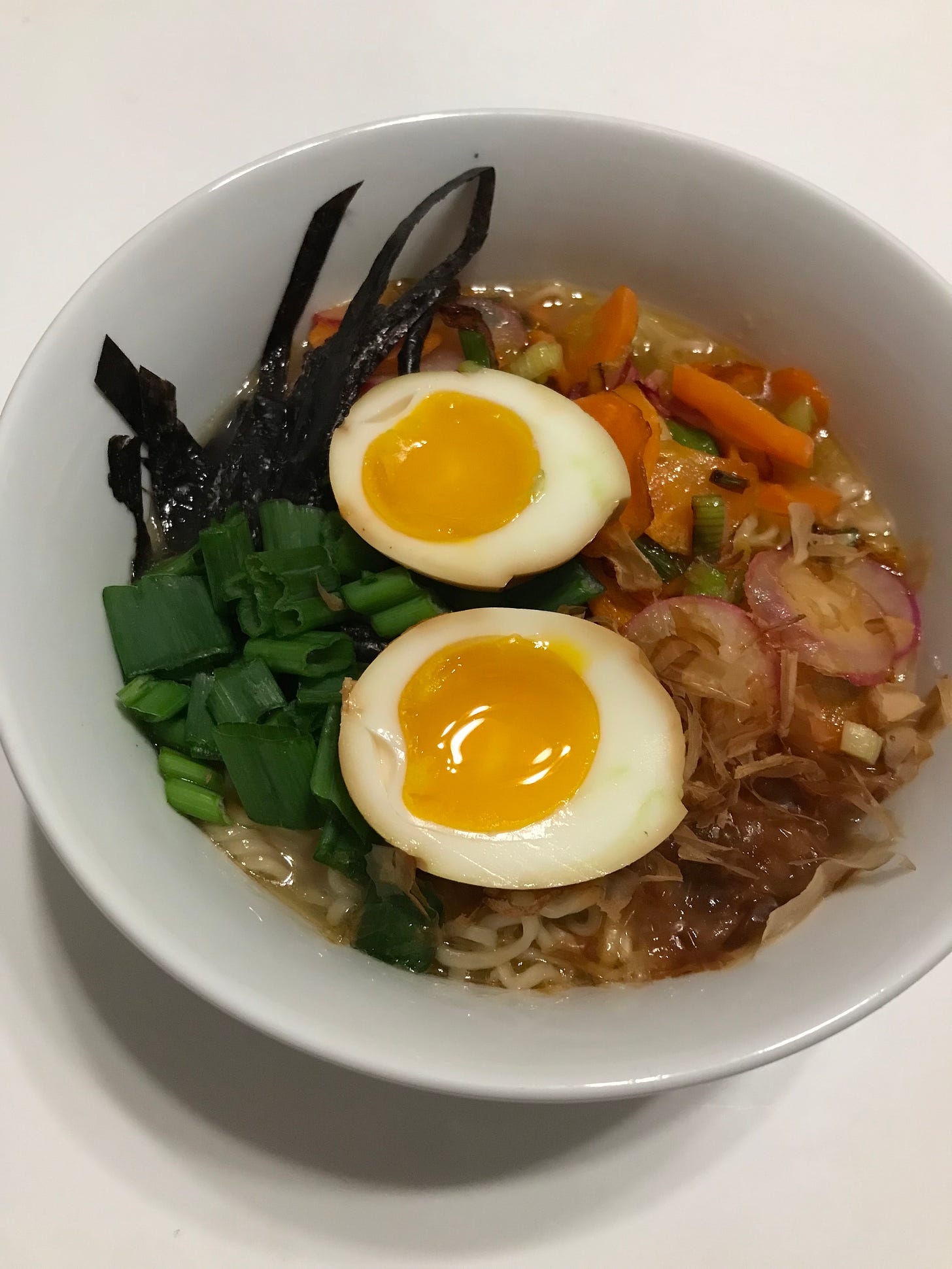 bowl of ramen with soft boiled marinated eggs