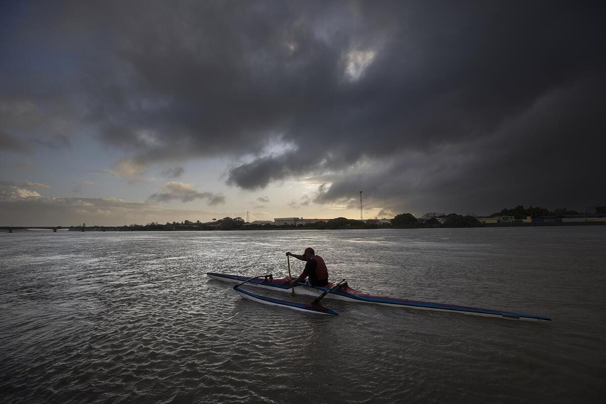 Tahi Nepia, a waka ama (outrigger canoe) paddler and caretaker at a Maori immersion school, travels on the Whanganui River in New Zealand on June 14, 2022.