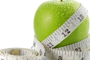 Apple with a tape measure