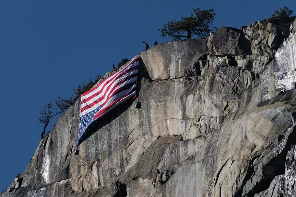 The upside-down flag, hung at Yosemite, marks a sign of national distress.