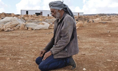 Sliman al-Zawahri, 52, prays in the empty village of Ein Rashash in Area C of the West Bank.