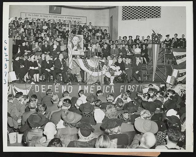 Lindbergh speaks again Fort Wayne, Ind. - Backed by a large portrait of  George Washington, Charles A. Lindbergh addresses some 3,000 persons at an America  First rally in Fort Wayne's Gospel Temple.