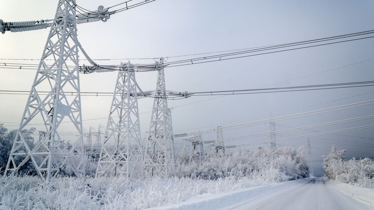 High voltage power lines in the winter.