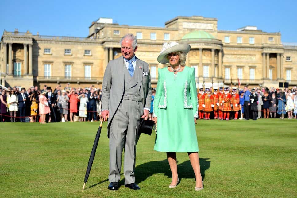 Charles and Camilla during a garden party at Buckingham Palace (Dominic Lipinski/PA)