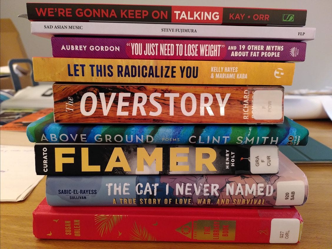 Stack of book spines; titles from bottom to top: The Library Book, The Can I Never Named, Flamer, Above Ground, The Overstory, You Just Need To Lose Weight and 19 Other Myths about Fat People, Sad Asian Music, We're Gonna Keep On Talking.