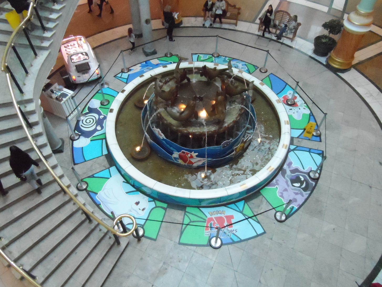 The fountain was surrounded with artwork of water-type Pokémon