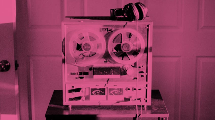 An old reel-to-reel tape recorder.