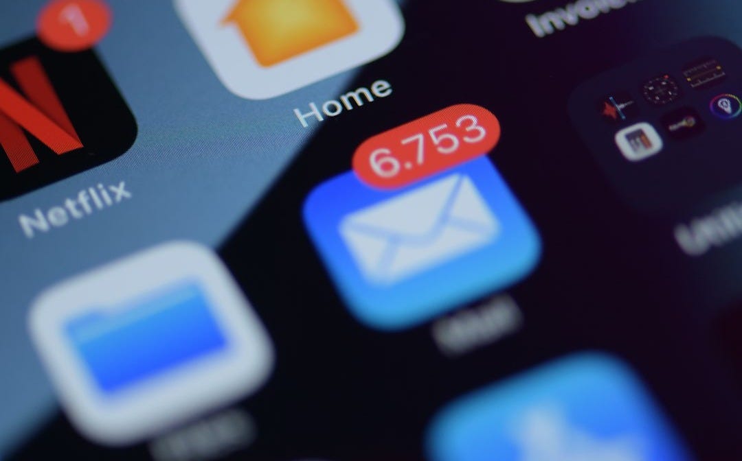 a close up of a cell phone with various app icons