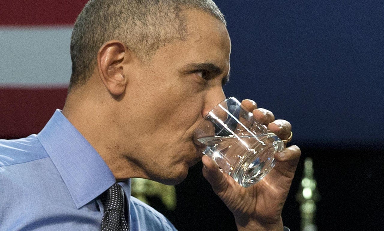 Obama drinks Flint water to show residents that it's safe – video | US news  | The Guardian