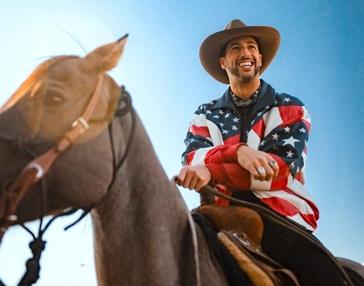US GP: Daniel Ricciardo arrives in style on horseback