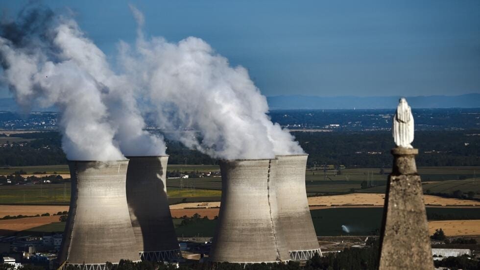 File photo: Steam rises from the cooling towers of the Bugey nuclear power plant in Saint-Vulbas, central France on July 20, 2023. 
