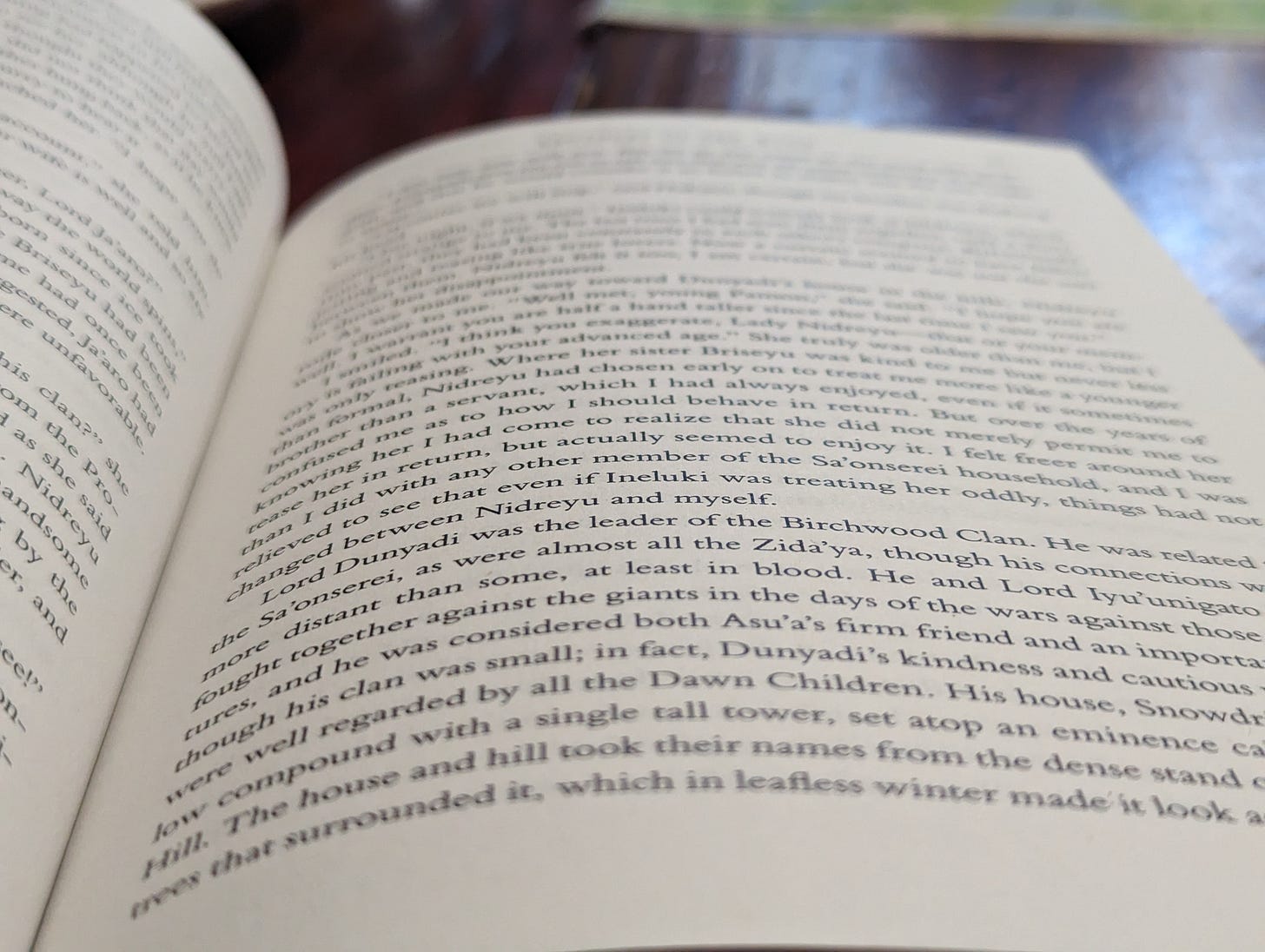 A close-up image of the page of a book, with only some words in focus.