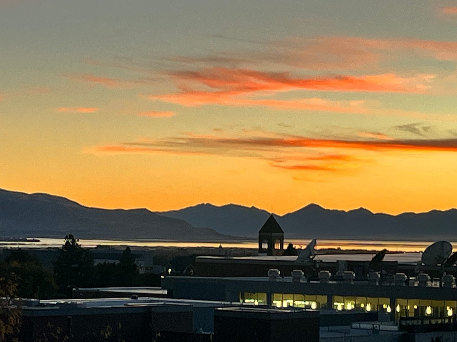 A photograph of the mountains at sunset.