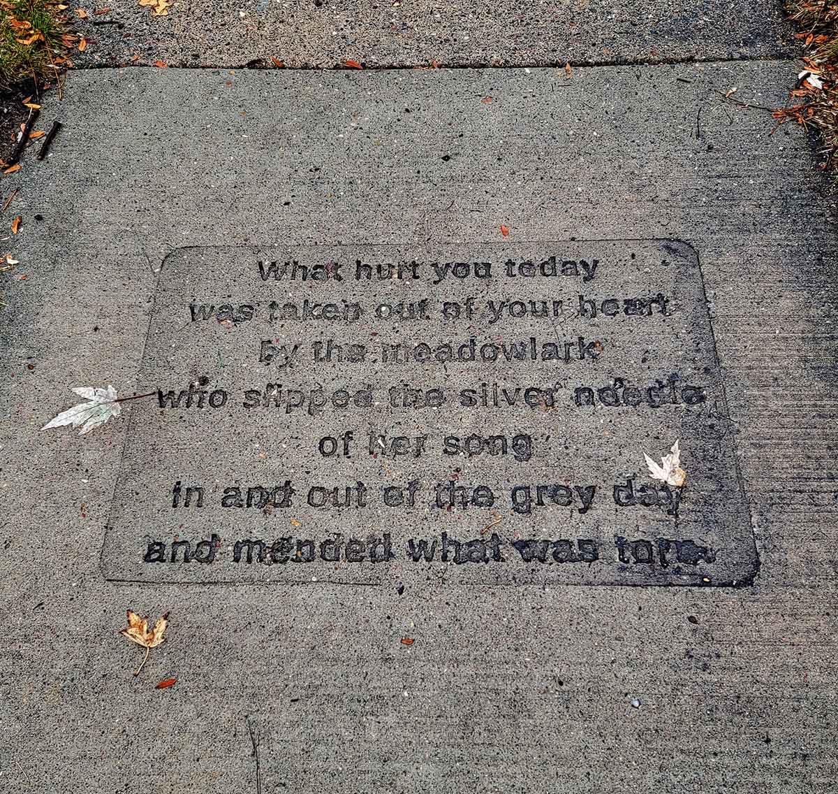 A poem embedded in the sidewalk.