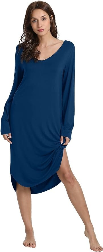 Brunette women in full length long sleeve sea blue nightgown with a wide v-neck