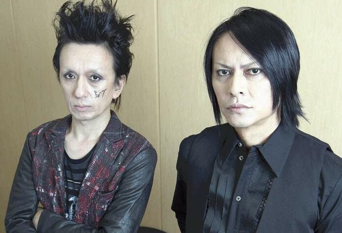 Sakurai (on the right in the picture) dies at the age of 57 due to cerebral hemorrhage.