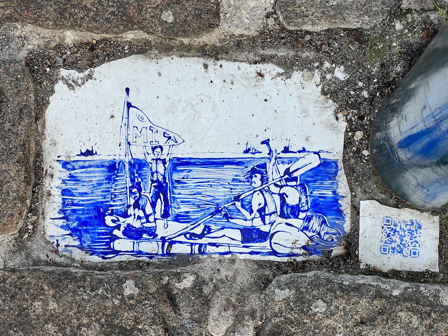 A handpainted tile showing people enjoying a raft on the water. To the right of it is a QR code also handpainted.