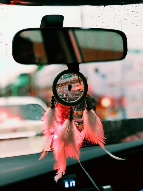 Free Hanging Dreamcatcher on Rearview Mirror Stock Photo Free Hanging Dreamcatcher on Rearview Mirror Stock Photo