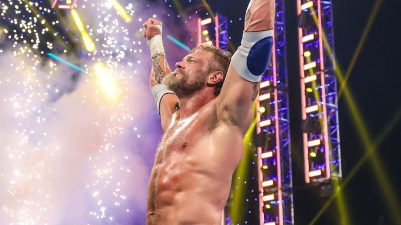 Edge celebrates his "WWE SmackDown" win over Sheamus
