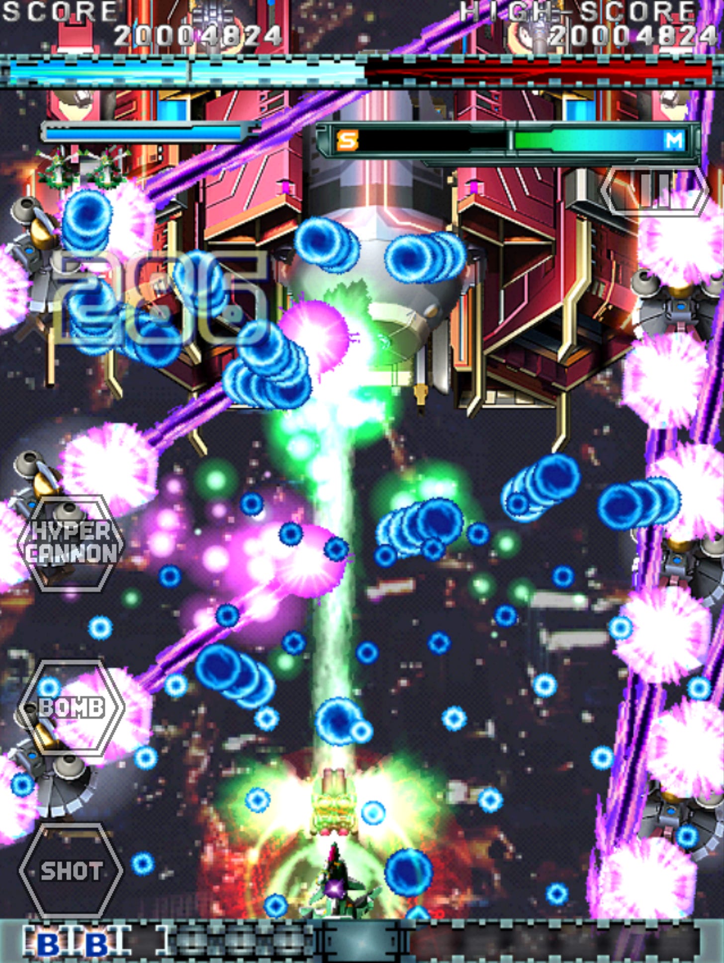 Clouds of blue bullets and webs of lasers fill the screen from a boss