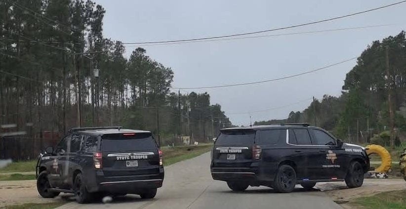 Texas State Troopers block a street in Colony Ridge while conducting a joint operation with federal officers on Monday, Feb. 24, 2025. Texas State Troopers block a street in Colony Ridge while conducting a joint operation with federal officers on Monday, Feb. 24, 2025.