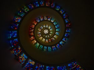 The Glory Window inside a chapel at Thanks Giving Square in Dallas Texas