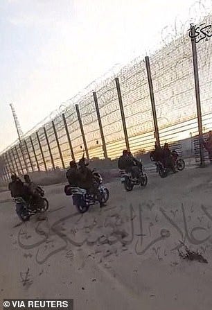 Another image issued by the militants appears to show troops on motorcycles riding through a hole in the Gaza border fence