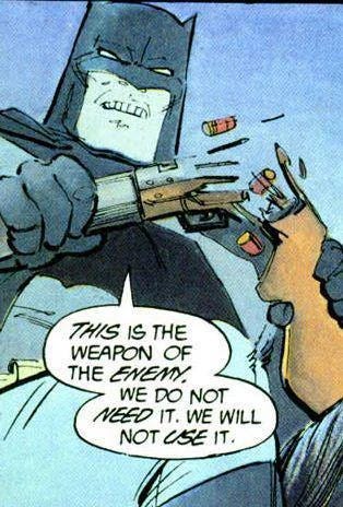 Batman breaks a rifle in half. He says "This is the weapon of the enemy. We do not need it. We will not use it."