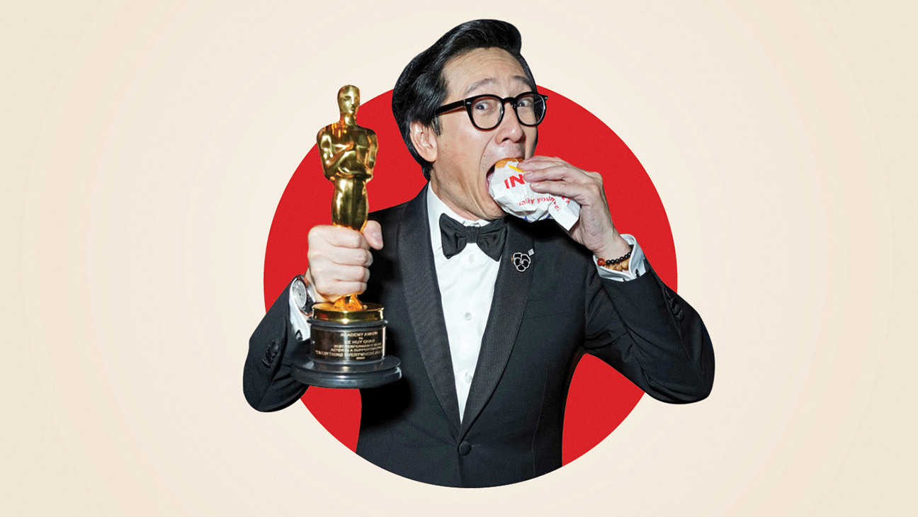 Ke Huy Quan, hoisting his best supporting actor Oscar for Everything Everywhere All at Once, celebrated with an In-N-Out burger at the Vanity Fair party last year.