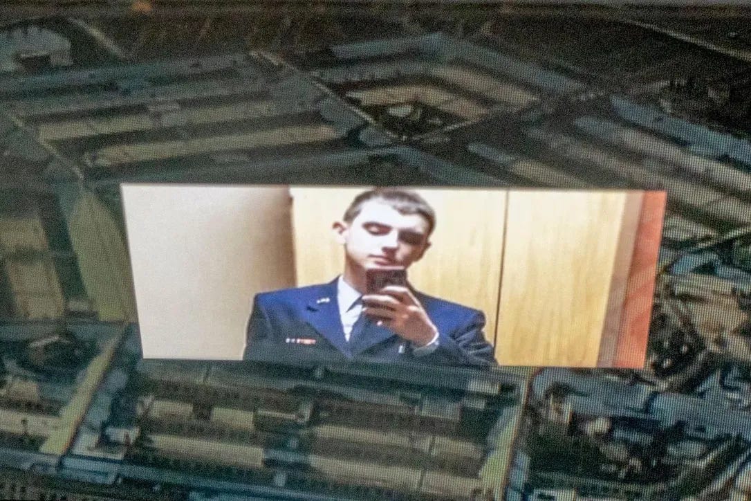 This photo illustration shows U.S. Air Force National Guard member Jack Douglas Teixeira, reflected in an image of the Pentagon in Washington, D.C. FBI agents on Thursday arrested Teixeira, who is suspected of being behind a major leak of sensitive U.S. government secrets, including about the Ukraine war.