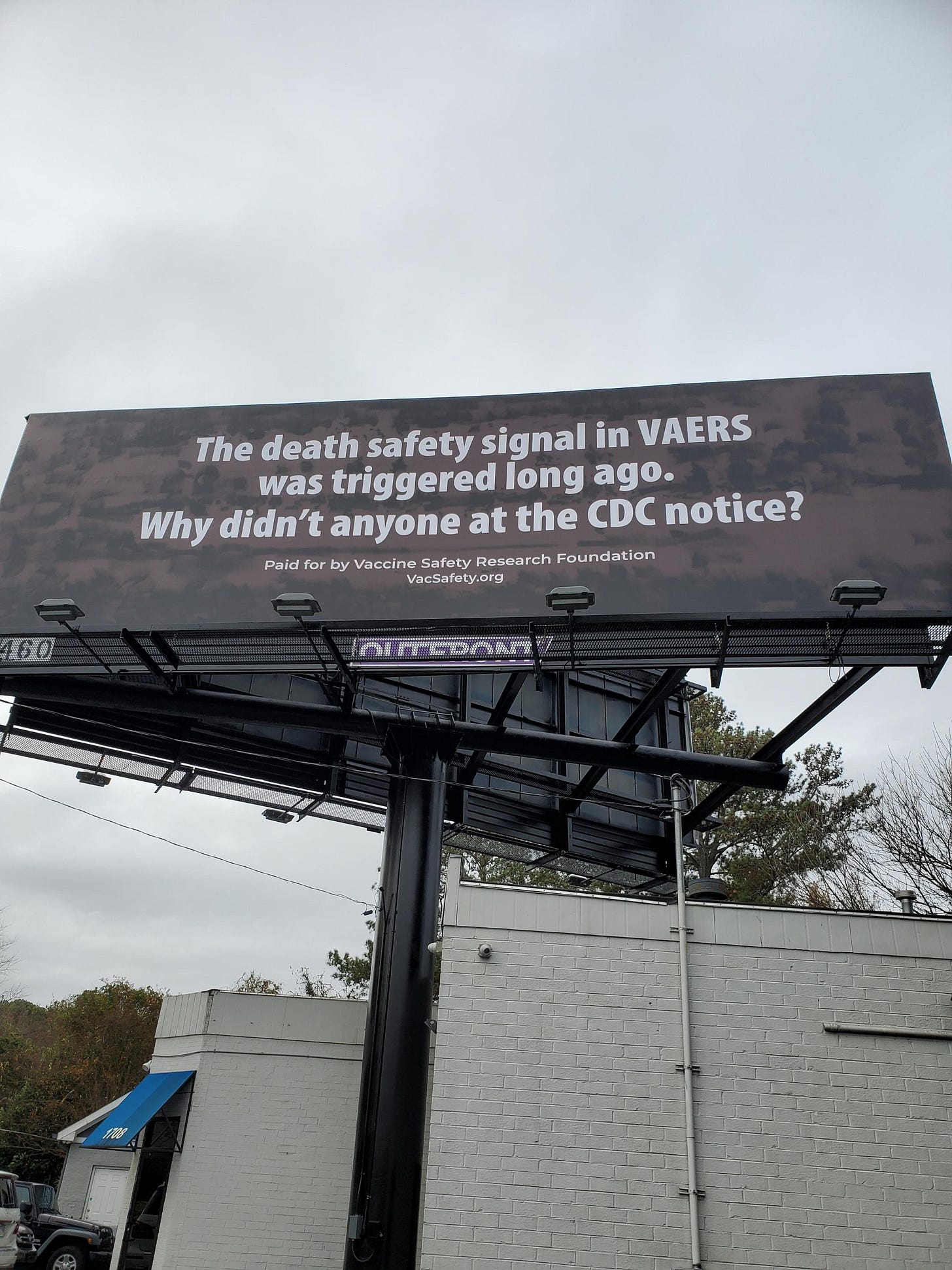Billboards are up! [Covid 'shots' billboards outside CDC Headquarters]