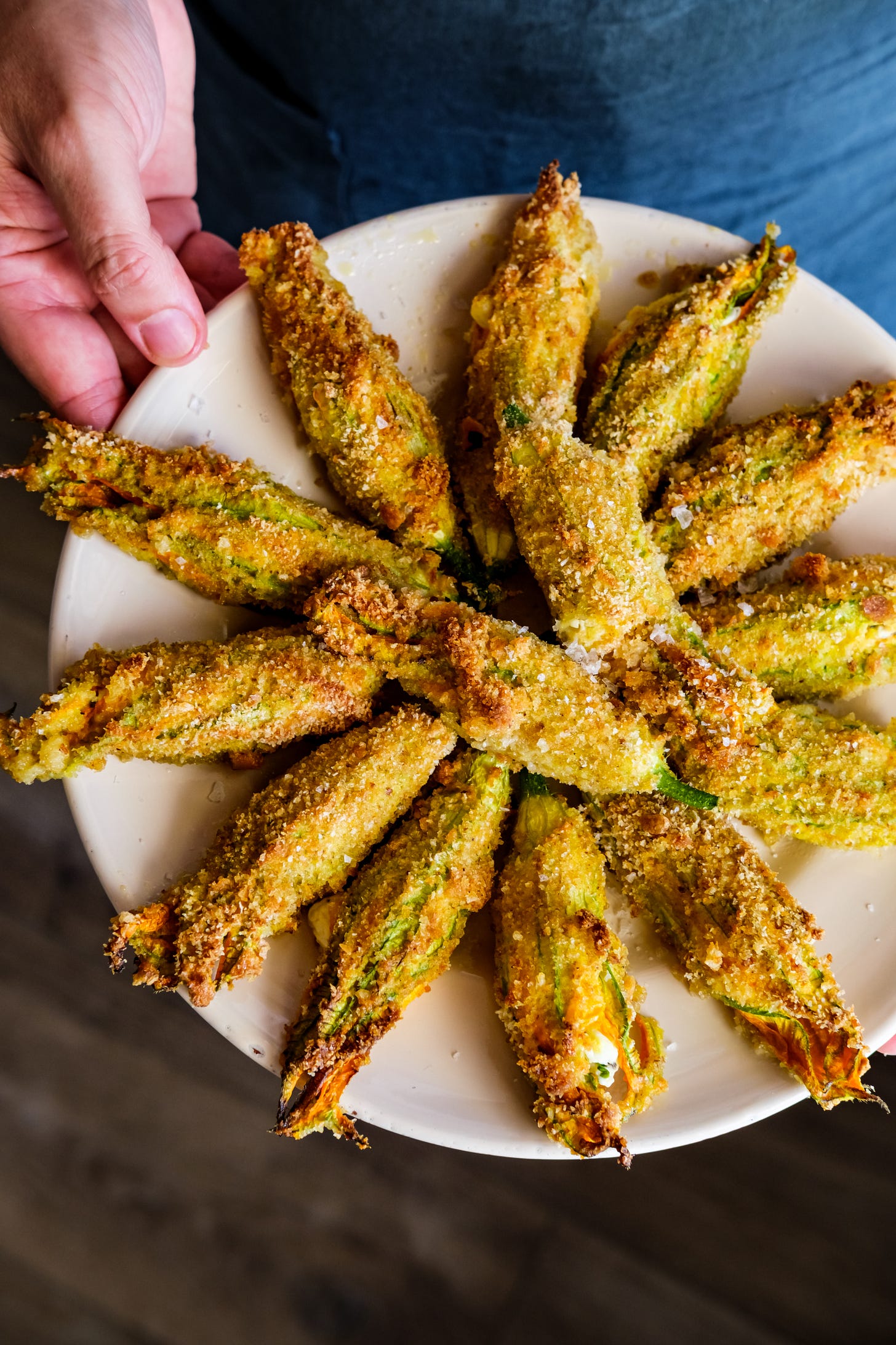 Baked stuffed squash blossoms by Giulia Scarpaleggia