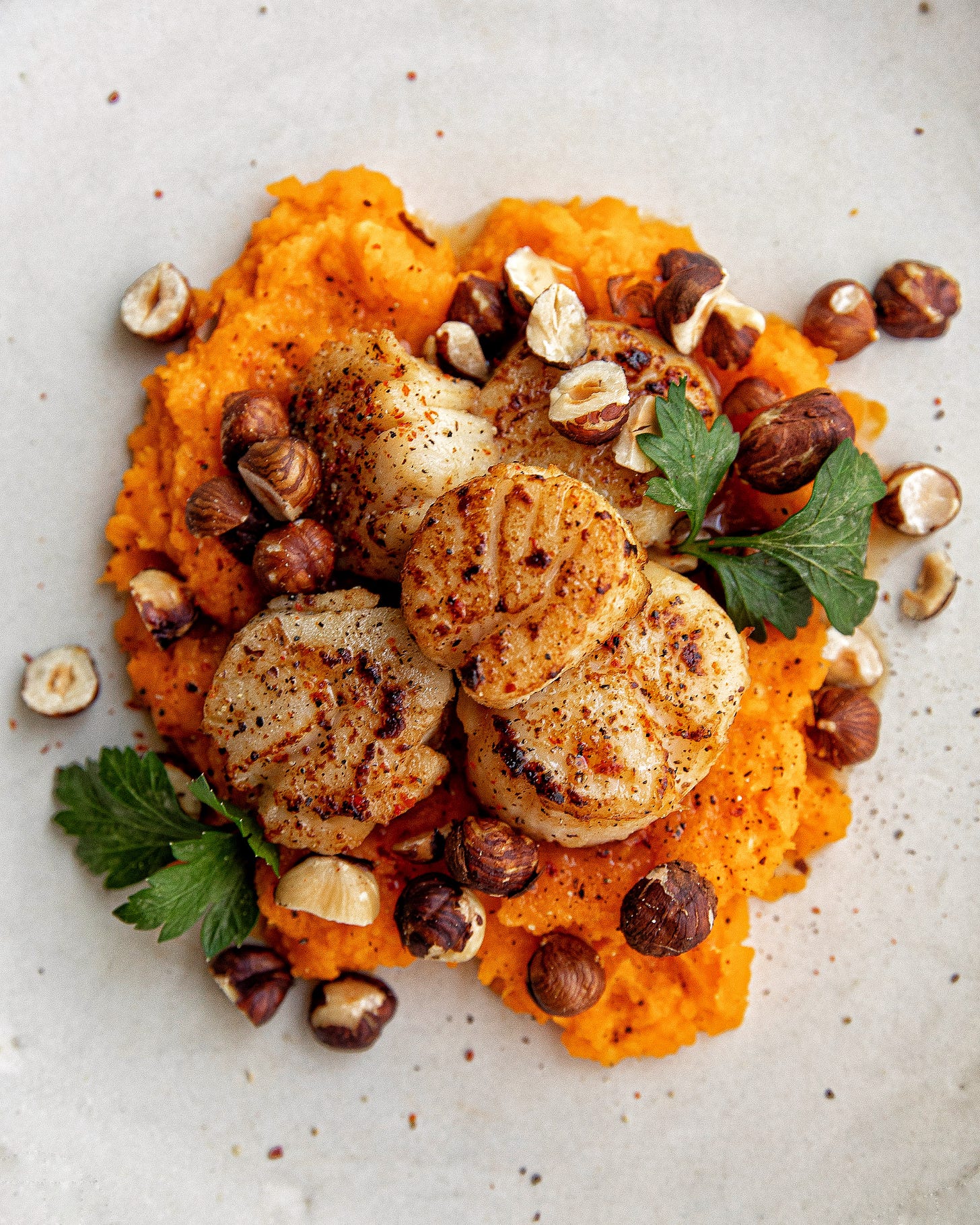 Seared Scallops over Sweet Potato Purée by Carina Wolff