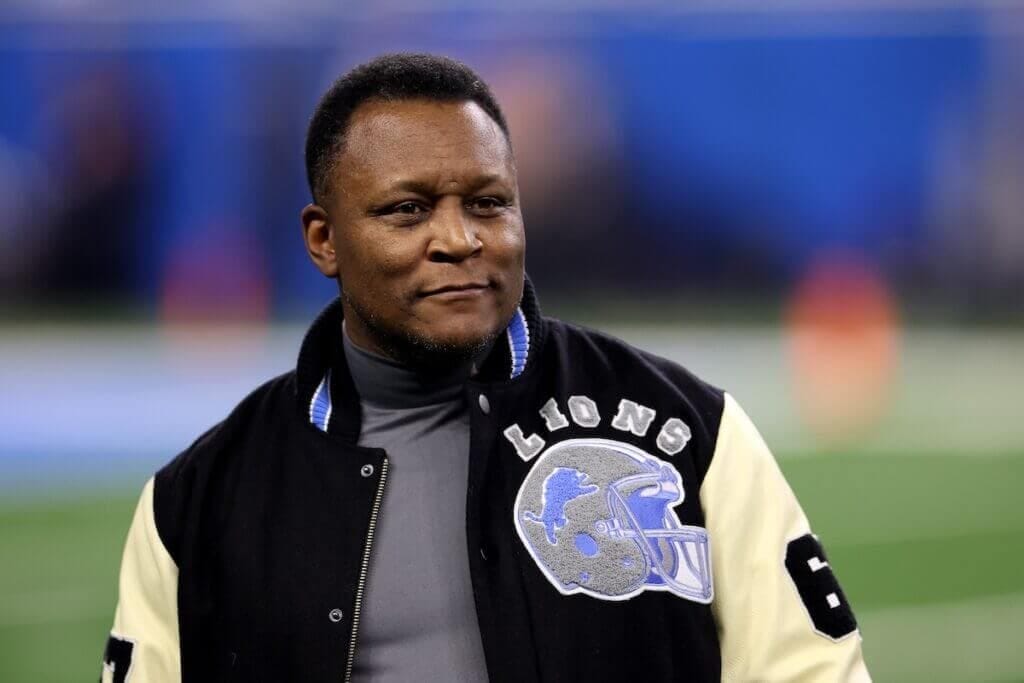 DETROIT, MICHIGAN - JANUARY 14: Former NFL player Barry Sanders of the Detroit Lions reacts during the first half between the Los Angeles Rams and Detroit Lions in the NFC Wild Card Playoffs at Ford Field on January 14, 2024 in Detroit, Michigan. (Photo by Gregory Shamus/Getty Images)