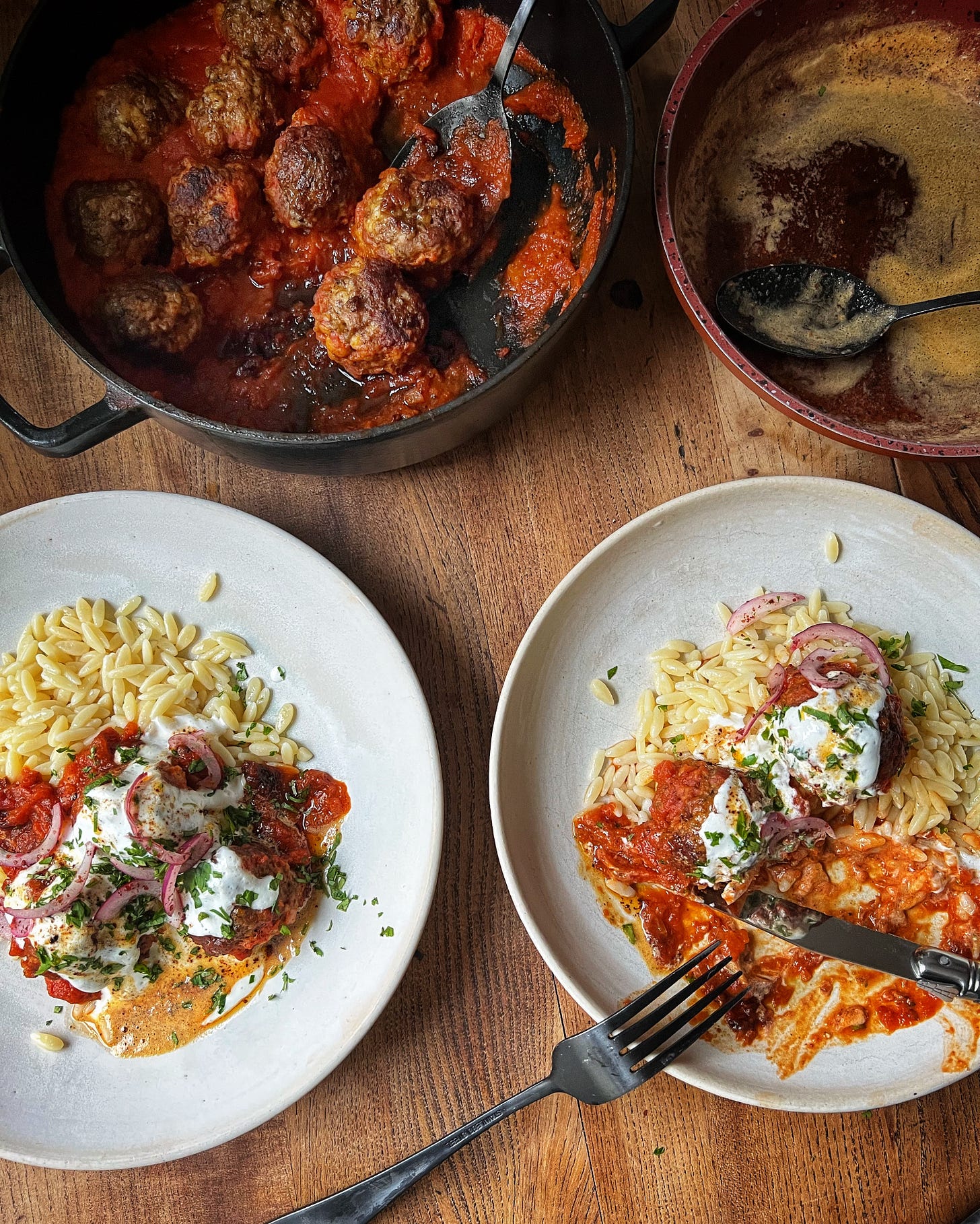 Spiced lamb meatballs in fragrant tomato sauce with pul biber butter