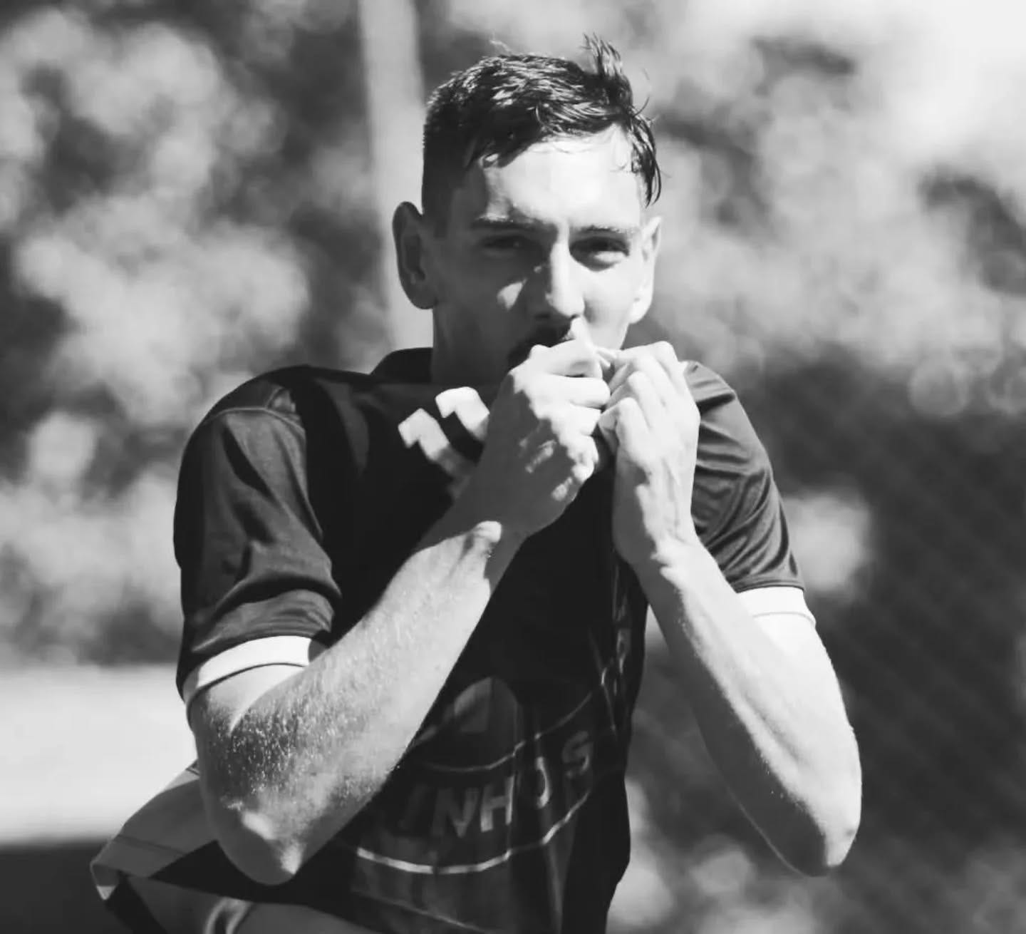 May be a black-and-white image of 1 person, playing soccer and playing football