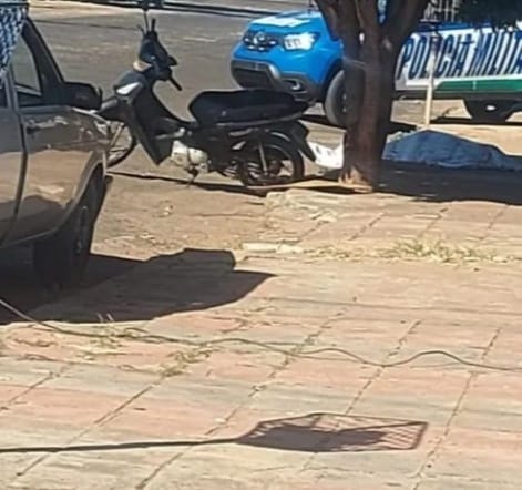May be an image of car, motorcycle and scooter
