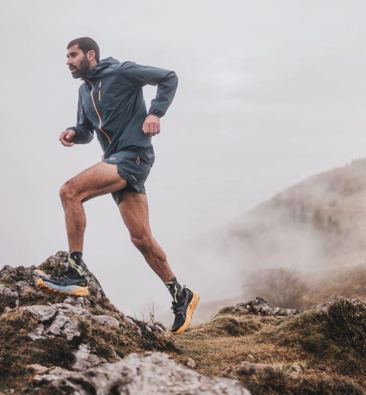 Team top asics trail