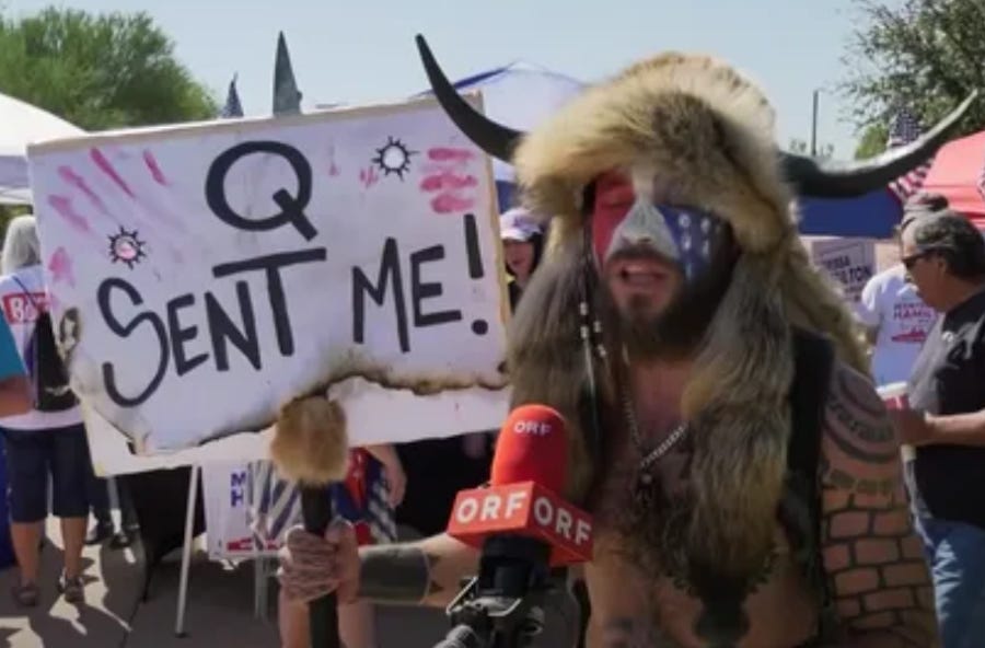 In Which Congressional Hopeful QAnon Shaman Chases Matt Gaetz Around Charlie Kirk’s AmericaFest