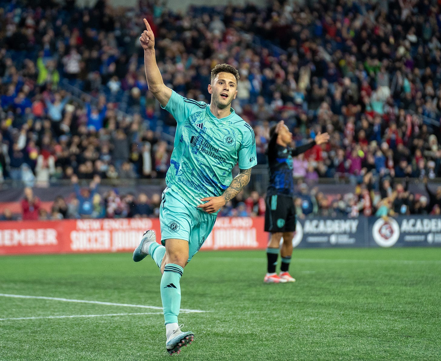 Revolution Make Trade, Vrioni Receives Green Card