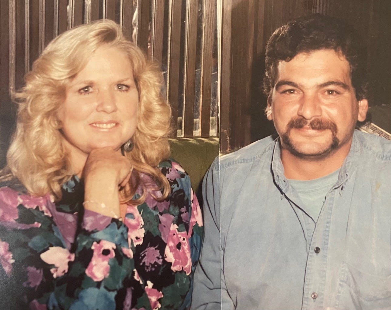 Woman with longer blond hair and man in blue shirt