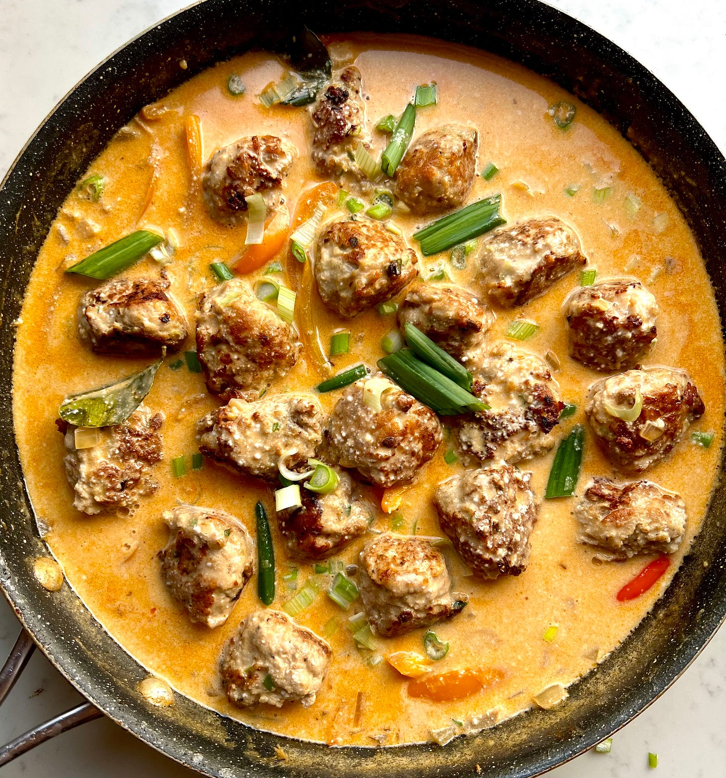 Turkey meatballs in creamy curry sauce by Abby Cooper