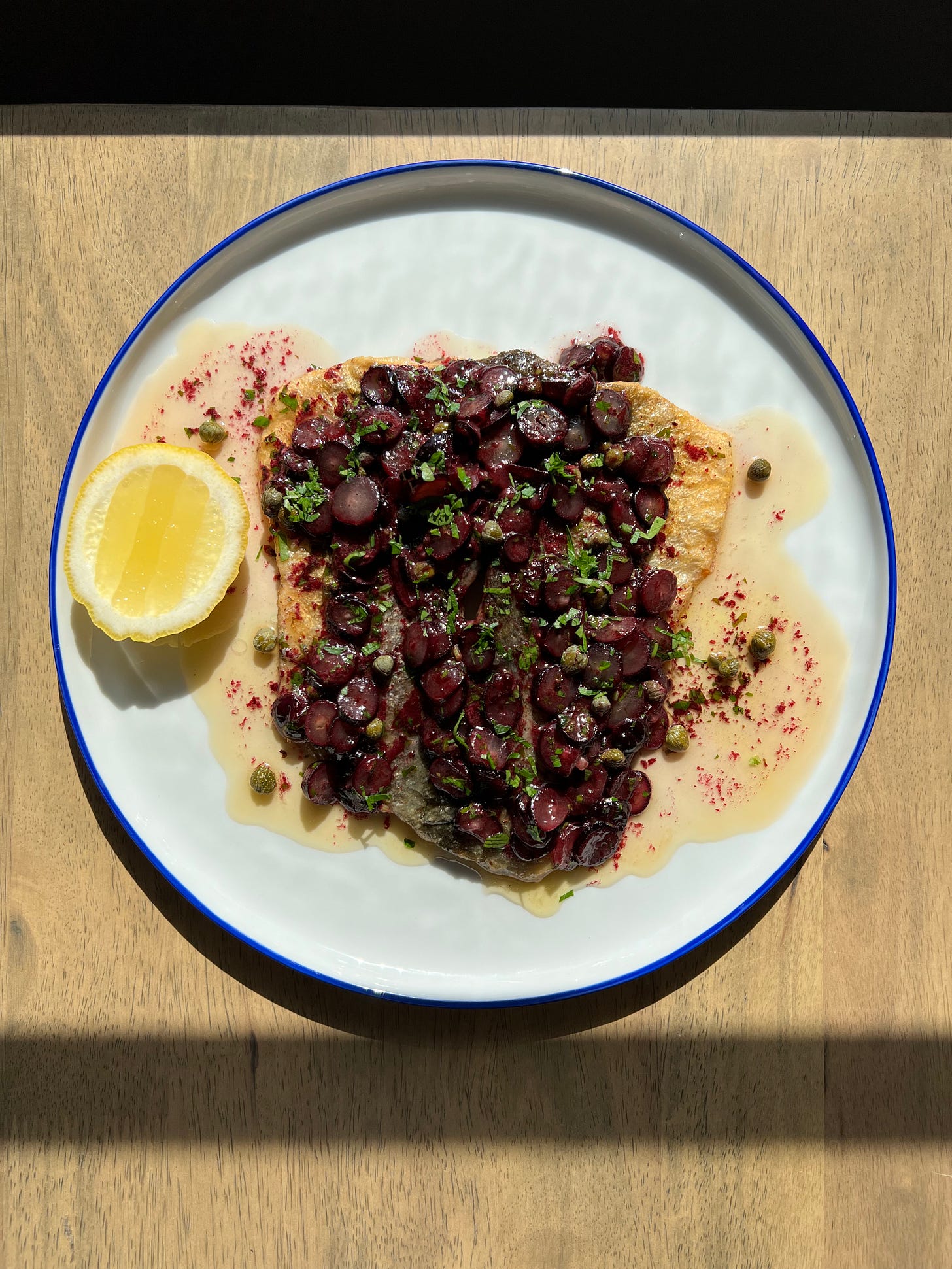 trout with brown butter and grapes by Chuck Cruz Chuck