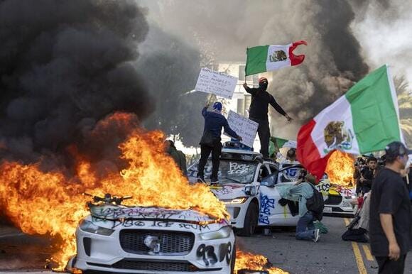 Multiple Waymo vehicles set on fire during Los Angeles riots - NewsBreak