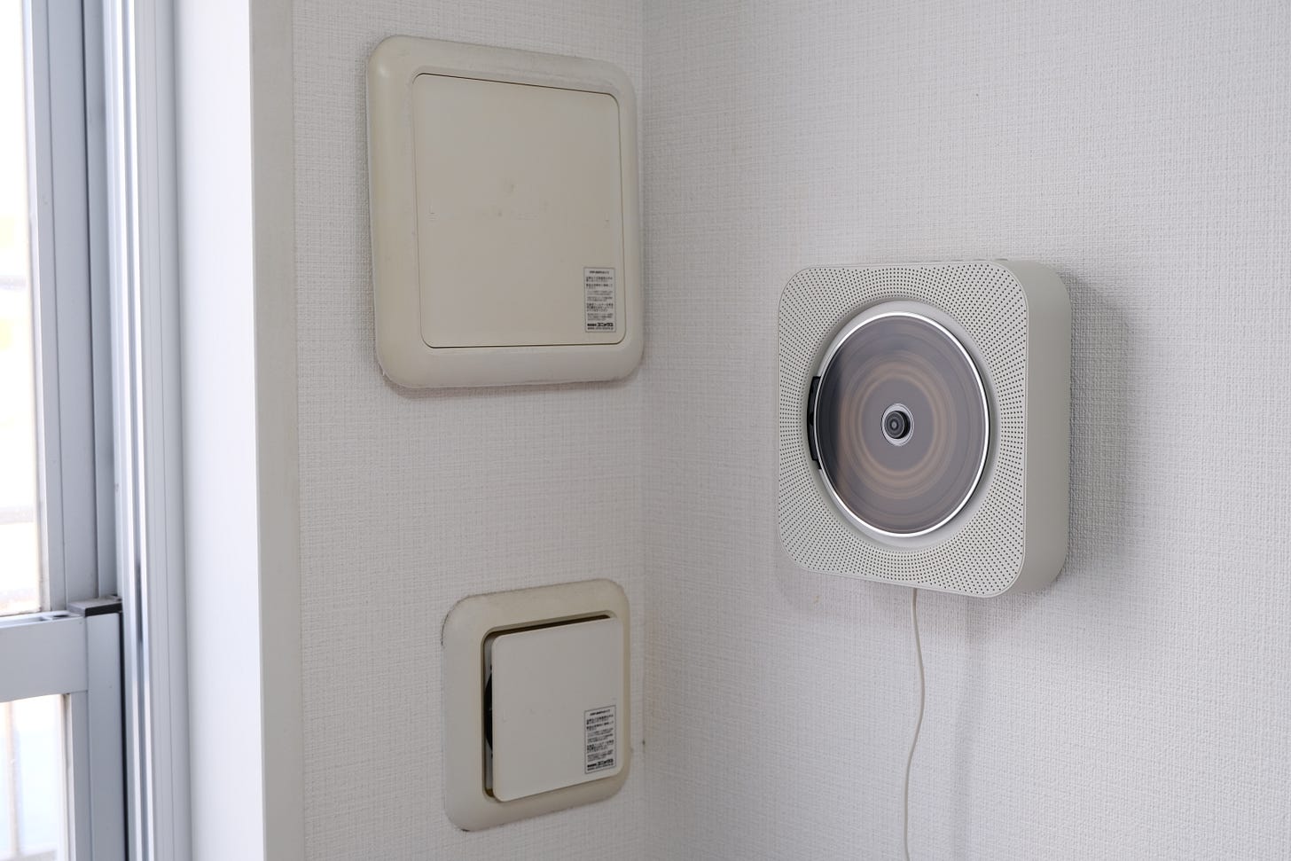 Muji Wallmounted CD Player review by Sam Byford